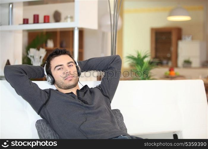 Man relaxing with music