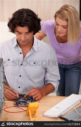 Man repairing computer
