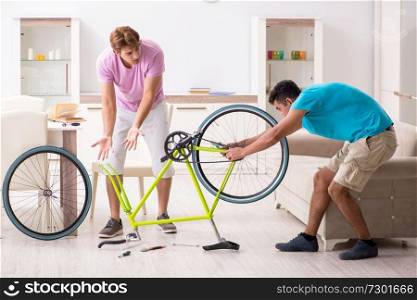 Man repairing his broken bicycle
