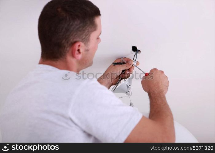 Man repairing lighting