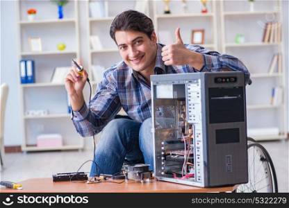 Man repairing pc with thumbs up