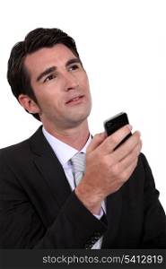Man replying to text message