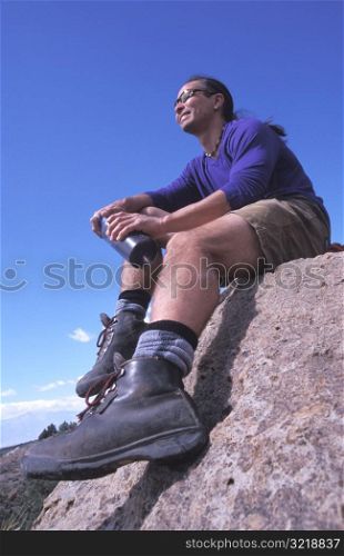 Man Resting During a Hike