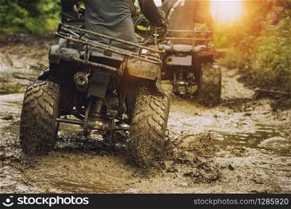 man riding atv vehicle on off road track ,people outdoor sport activitiies theme