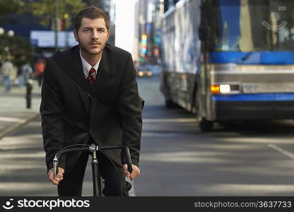 Man riding bicycle on street