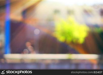 Man riding bicycle with rainbow on Trondheim street bokeh backgr. Man riding bicycle with rainbow on Trondheim street bokeh background hd
