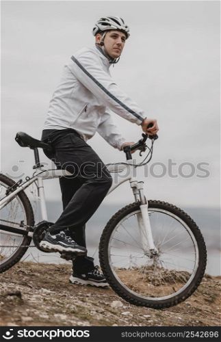 man riding bike cold day 2