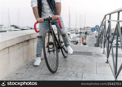 man riding bike town