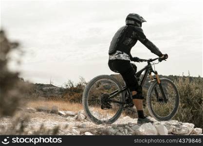 man riding mountain bike