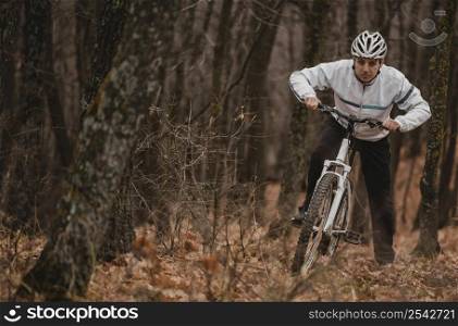 man riding mountain bike with copy space 2