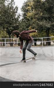 man riding skateboard outdoors