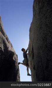 Man Rock Climbing Buttermilks CA