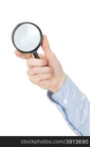 Man&rsquo;s hand holding magnifying glass