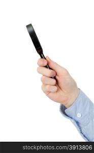 Man&rsquo;s hand holding magnifying glass