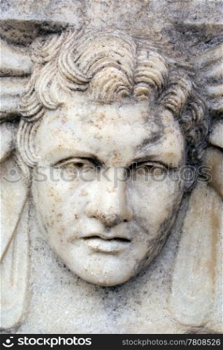 Man&rsquo;s marble head on the wall in Aphrodisias, Turkey