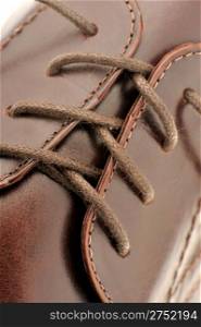 Man&rsquo;s shoes from a brown leather. A photo close up