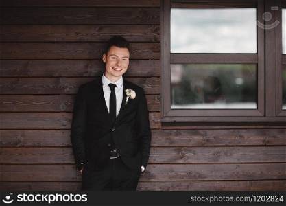 Man&rsquo;s style. Elegant young man. Close-up portrait of the man in a luxury classic trendy suit. portrait of the groom. Men&rsquo;s beauty, fashion. Man&rsquo;s style. Elegant young man. Close-up portrait of the man in a luxury classic trendy suit. portrait of the groom. Men&rsquo;s beauty, fashion.