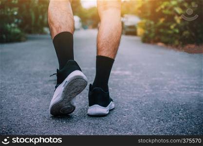 Man run on the street be running for exercise,Run sports background and closeup at running shoe