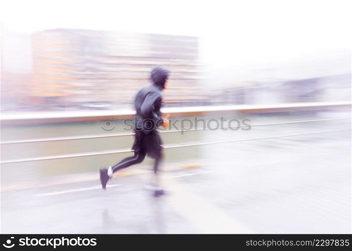 man runnig in Bilbao city, Spain