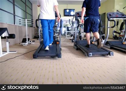 man running at treadmill at gym