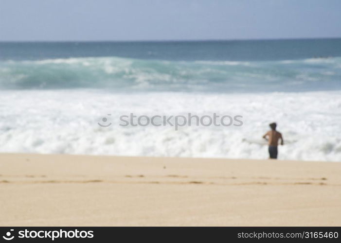 Man Running into Surf