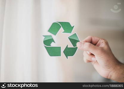 man s hand showing recycle icon . Resolution and high quality beautiful photo. man s hand showing recycle icon . High quality and resolution beautiful photo concept