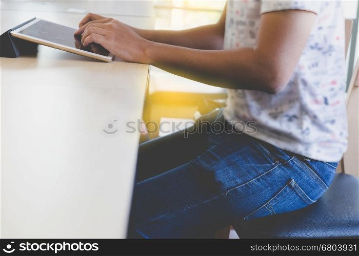 man's hand touching, using, working with digital tablet computer
