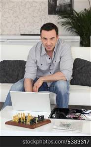 Man sat with laptop