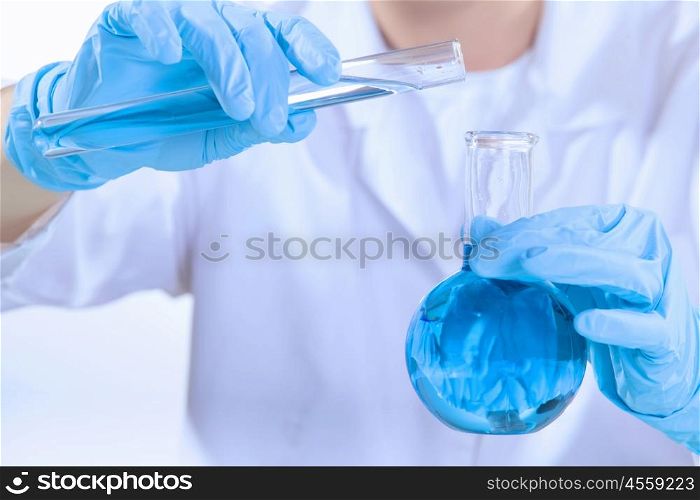 Man scientist. Image of man scientist working in laboratory with testing tubes