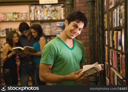 Man selecting a book