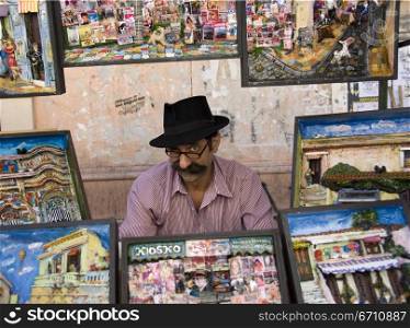Man selling paintings