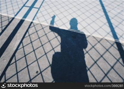 man shadow silhouette on the ground