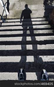 man shadow silhouette on the ground