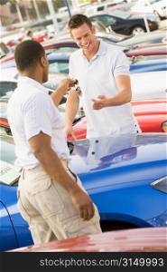 Man shopping for a new car