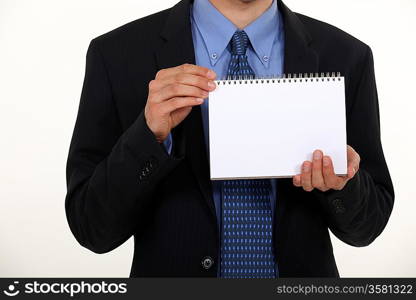 Man showing notebook