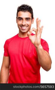 Man showing Ok sign over white background