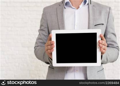 man showing tablet mockup