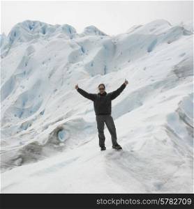 Man showing thumbs up on Perito Moreno Glacier, Los Glaciares National Park, Santa Cruz Province, Patagonia, Argentina