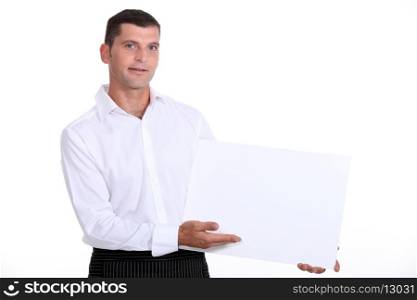 Man showing white panel