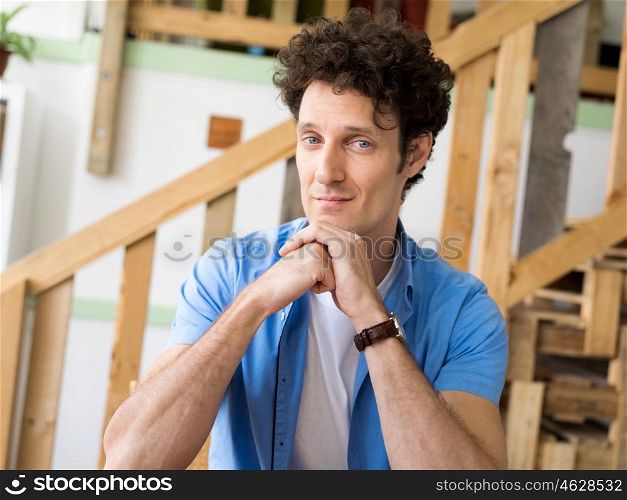 Man sitting at his desk in office