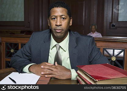 Man sitting in court, portrait