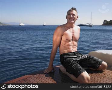 Man Sitting on Boat