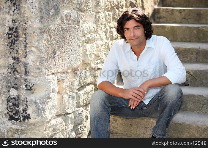 Man sitting on stairs