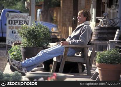Man Sitting on the Porch