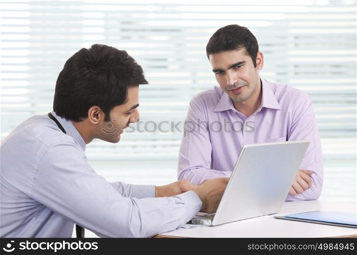 Man sitting with financial advisor