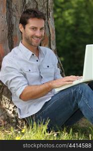 Man sitting with laptop