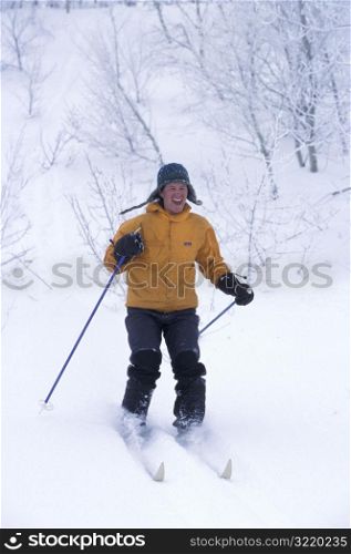 Man Skiing and Laughing