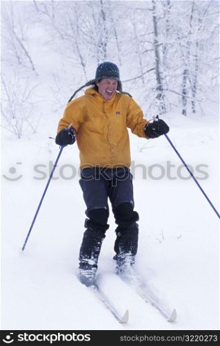 Man Skiing and Laughing