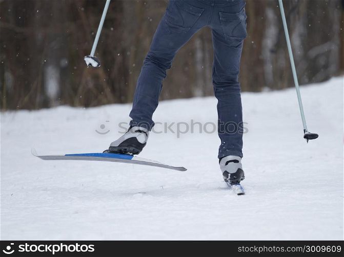 Man skiing cross-country in the winter park