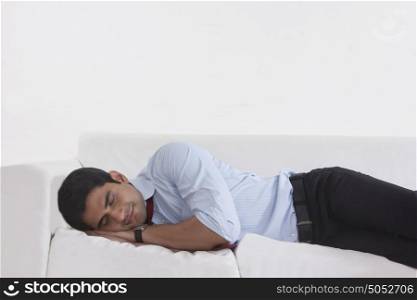 Man sleeping on sofa